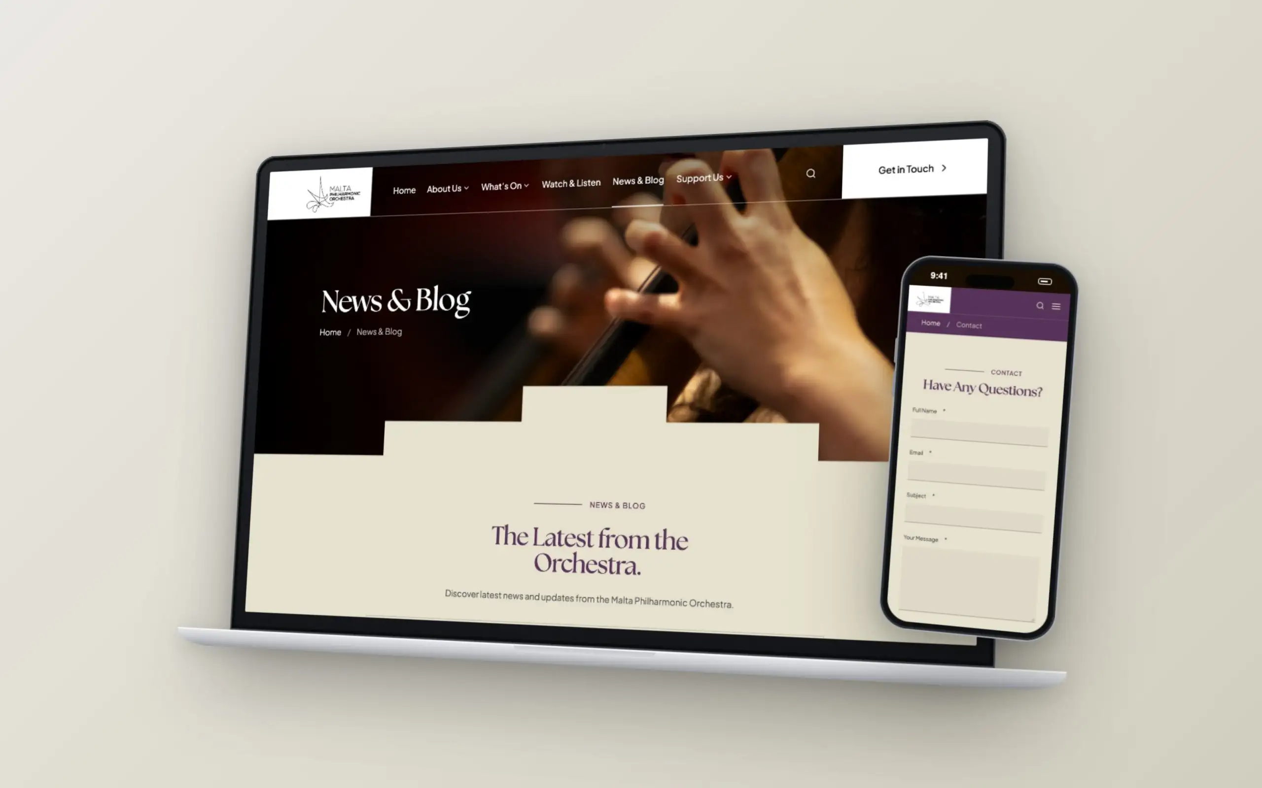 Malta Philharmonic Orchestra website on an angled laptop and a phone